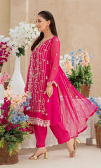 Shamooz- Mushq Volume 3. Wrap yourself in beautiful design with elegant embroidered along with adornment handwork. Paired with raw silk pants and a chiffon dupatta adorned with embroidered work, this outfit is a masterpiece of timeless beauty .