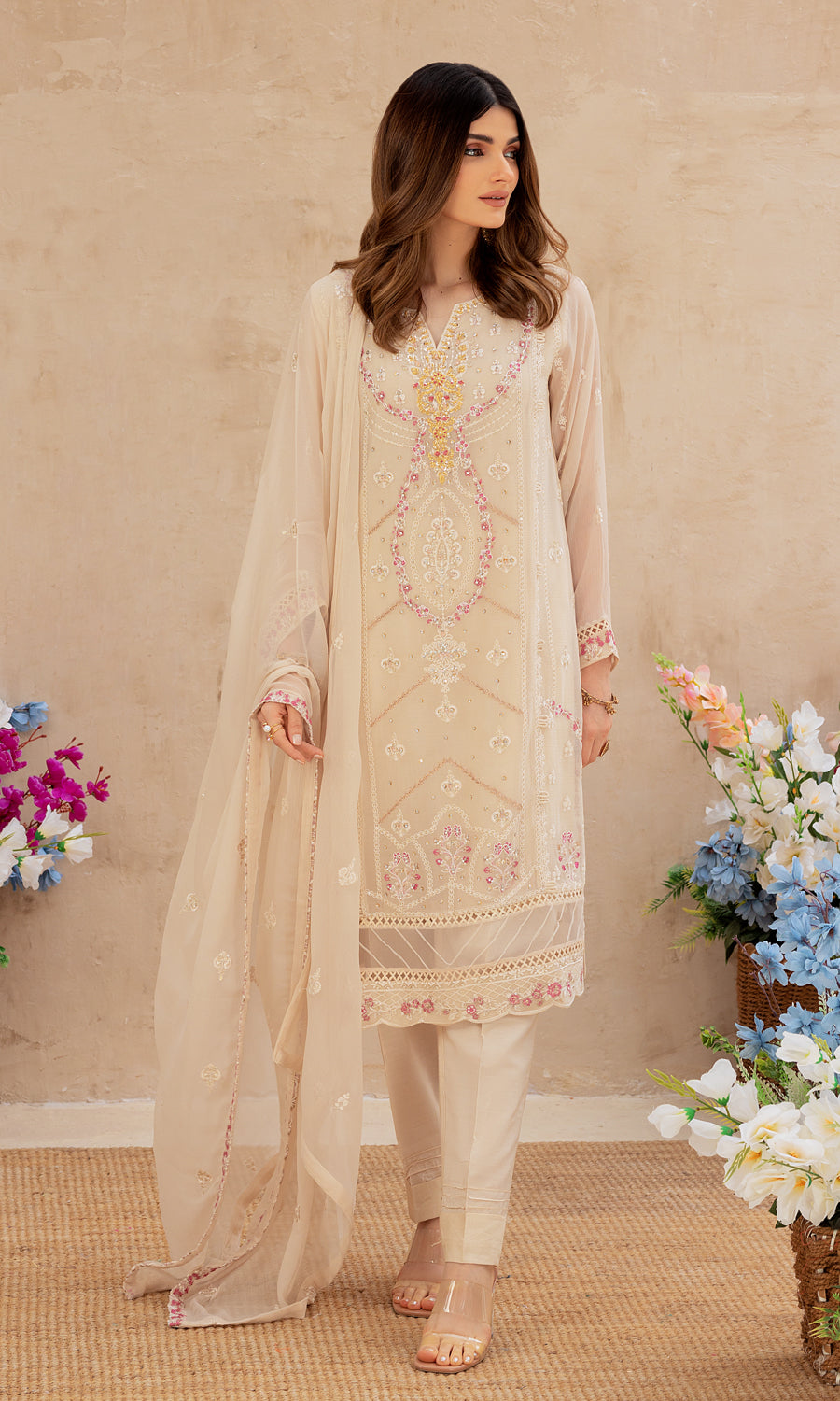Shamooz- Mushq volume 3. This elegance with style masterpiece with pastel color and embrodiery work on the front and side panel that enhances a blush of color.This elegant hand-embellished add-on sparkle of glamour.This ensemble is a perfect balance of every occassion.
