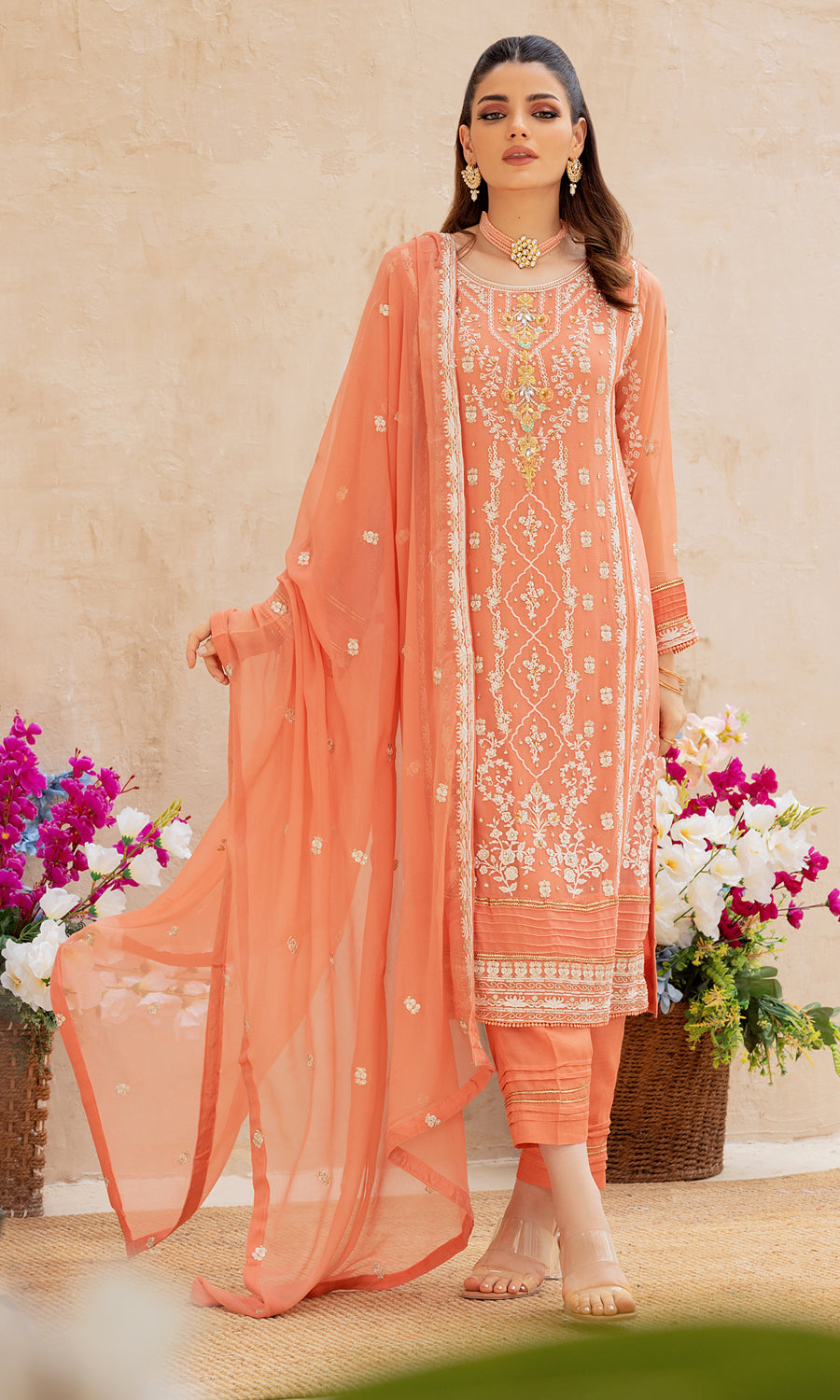 Shamooz- Mushq Volume 3. Step into elegance with style masterpiece with vibrant color and embrodiery work on the front and side panel that enhances a pop of color.The delicately hand-embellished add-on sparkle of glamour.This ensemble is a perfect balance of every occassion.
