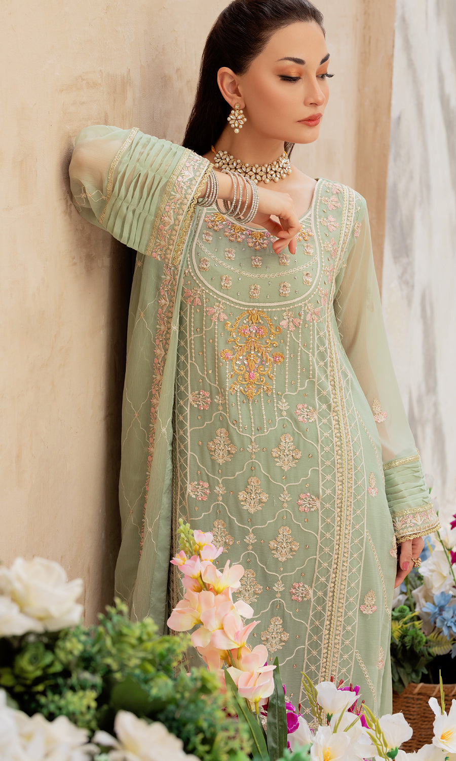 Shamooz. Mushq Volume 3. Step into elegance with this masterpiece with vibrant color and embrodiery work on the front and side panel that enhances a pop of color and elevate the design.The delicately hand-embellished adds a touch of glamour.This ensemble is a perfect balance of elegance.