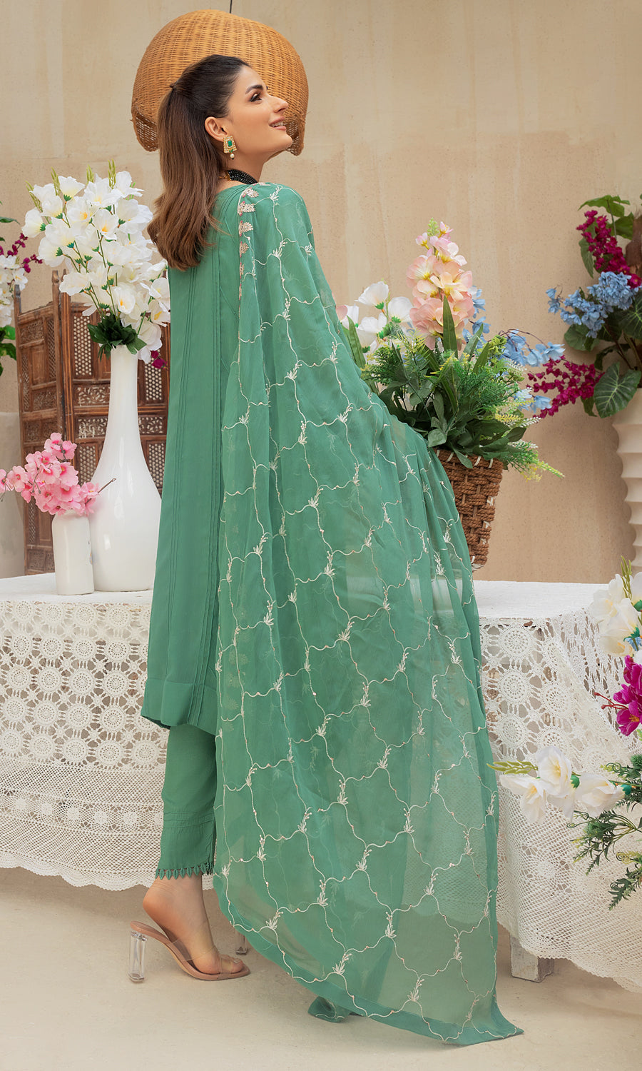 Shamooz-Mushq Volume 3. Step into elegance with this masterpiece with vibrant color and embrodiery work on the front and side panel that enhances a pop of color and elevate the design.The delicately hand-embellished adds a touch of glamour.This ensemble is a perfect balance of elegance.