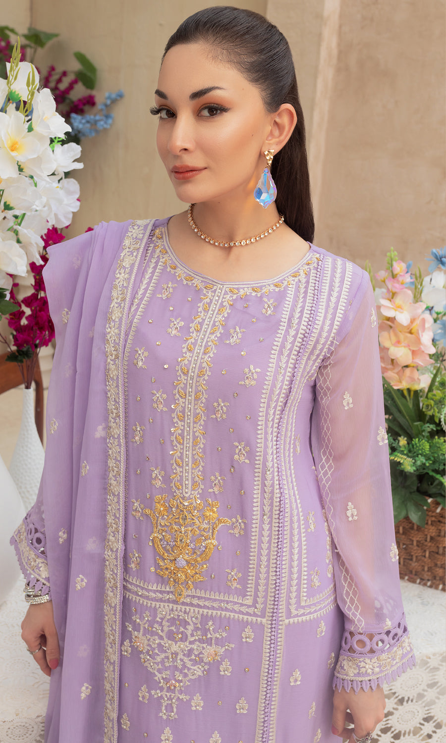 Shamooz. Mushq Volume 3. Step into a world of timeless elegance with this breathtaking vibrant color and embrodiery work on the front and side panel that enhances a pop of color and elevate the design.The delicately hand-embellished with every detail of this outfit exudes sophistication and refinement.